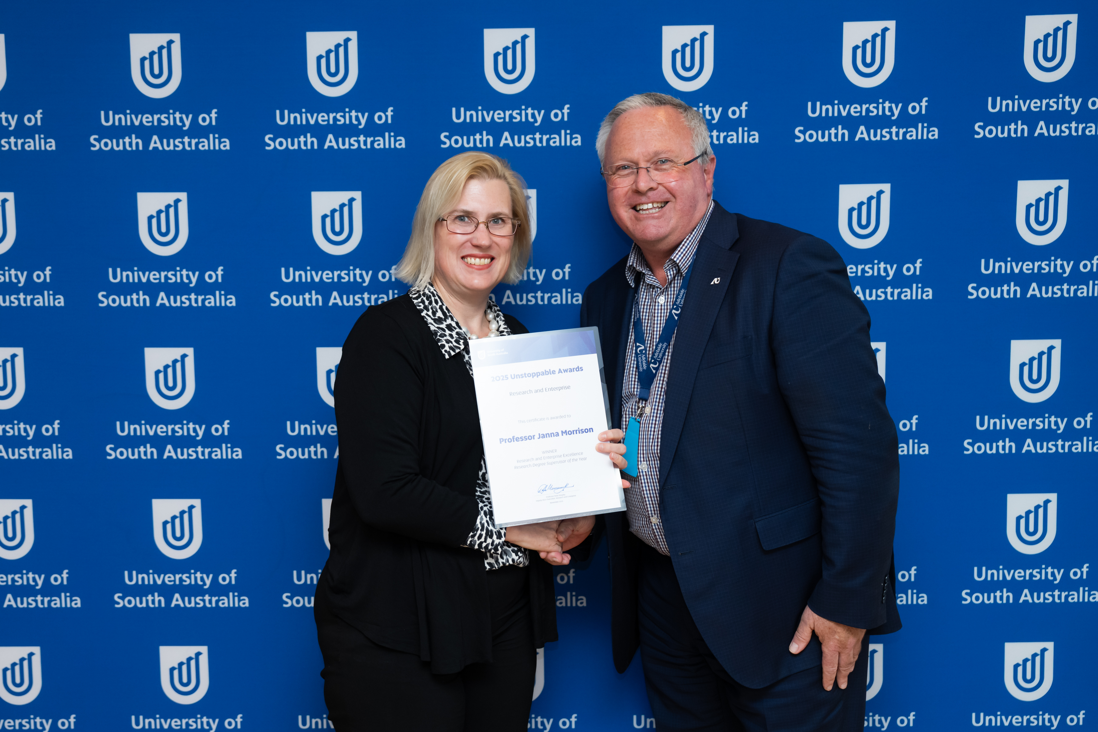 Professor Janna Morrison is awarded the Research Degree Supervisor of the Year Award by the Deputy Vice Chancellor: Research & Enterprise, Professor Peter Murphy