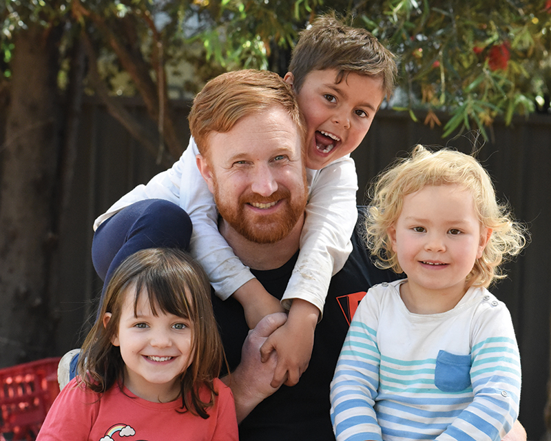 Early childhood teacher and UniSA graduate Rob Lister pictured with some of the children at Gowrie SA&rsquo;s Underdale centre, where he works. Photo by Cath Leo.