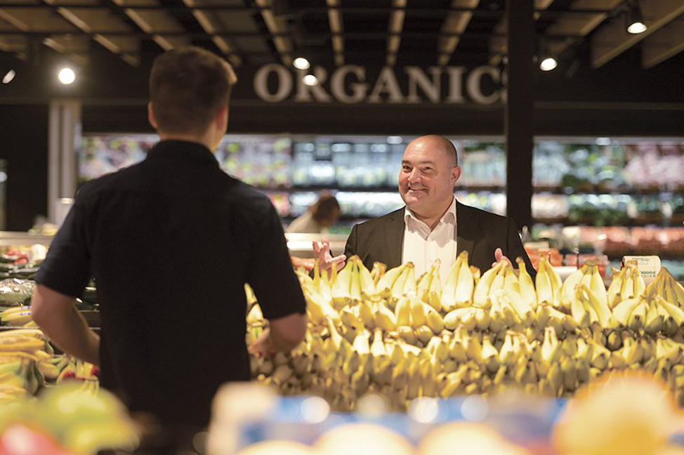 Franklin Dos Santos in the Fruit and Vegetable section of a Foodland store