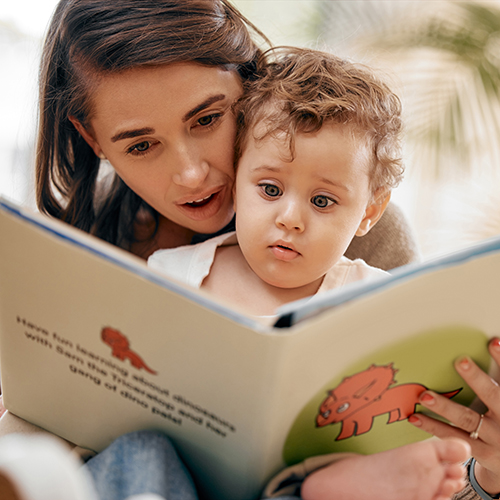 child and parent reading