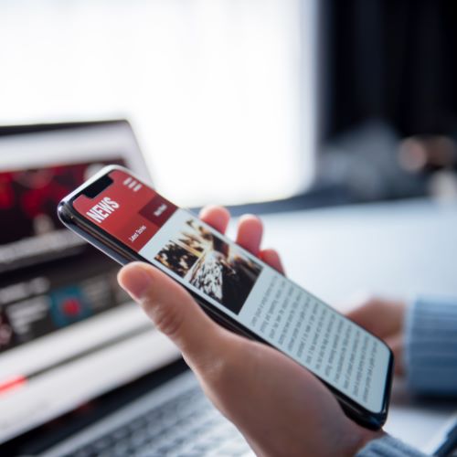 Reading the news on a smartphone