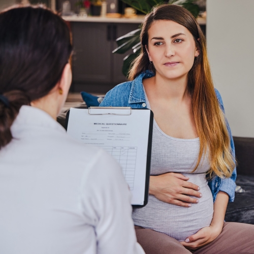 pregnant woman and doctor