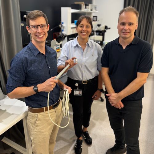 Three scientists in a lab