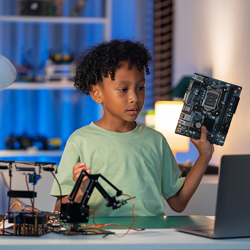 Boy learning about computers