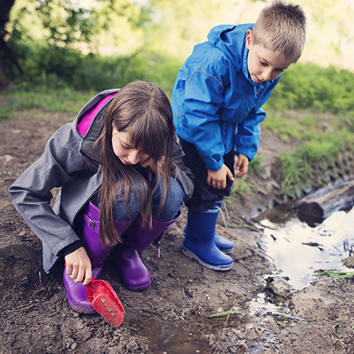 Kids making mud pies