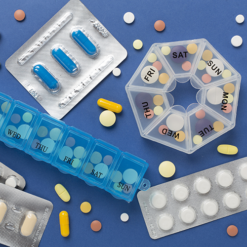 lots of different medicines scattered on a table