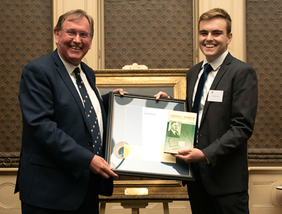 Head of St Mark&rsquo;s College Professor Don Markwell presents William Gillett with the scholarship. 