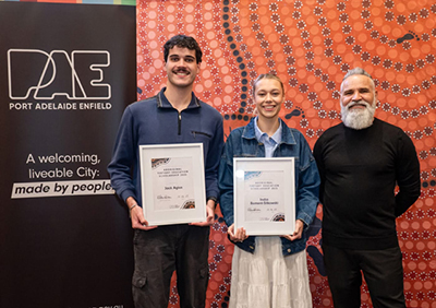 UniSA students Jack Agius and India Bament-Sitkowski, with City of Port Adelaide Enfield Aboriginal Community Development Lead Rodney Welch. 