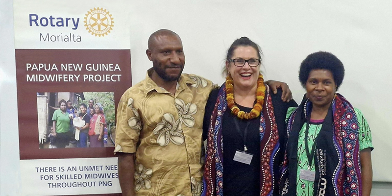 Dr Angela Brown with PNG midwife buddies Steven Gola Junior and Stacey Mange.